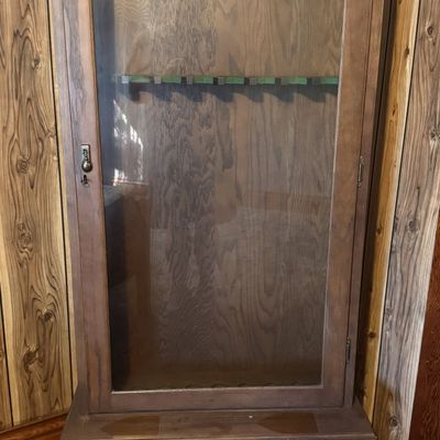Sale Photo Thumbnail #208: Vintage Eight Gun Oak Finish Display Cabinet with Storage Base