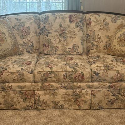 Sale Photo Thumbnail #417: Broyhill Floral Tapestry Upholstered Three Cushion Sofa with Exposed Wood Trim