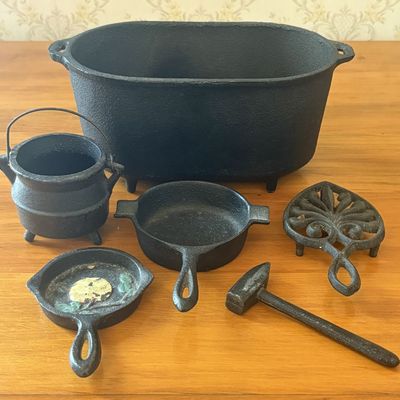 Sale Photo Thumbnail #467: A Collection of Miniature Cast Iron Cookware and Kitchen Items