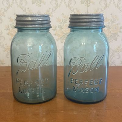 Sale Photo Thumbnail #134: A Pair of Ball Perfect Mason Blue Glass Quart Canning Jars with Zinc Lids