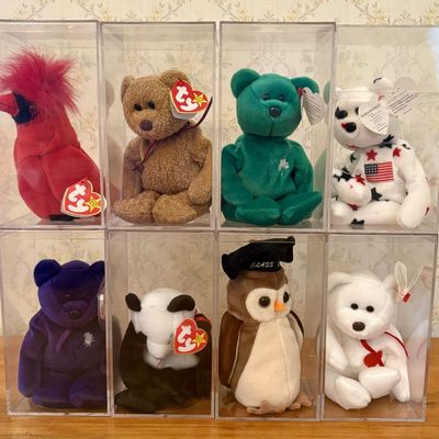 Sale Photo Thumbnail #595: A Collection of Eight Ty Beanie Babies in Protective Display Cases