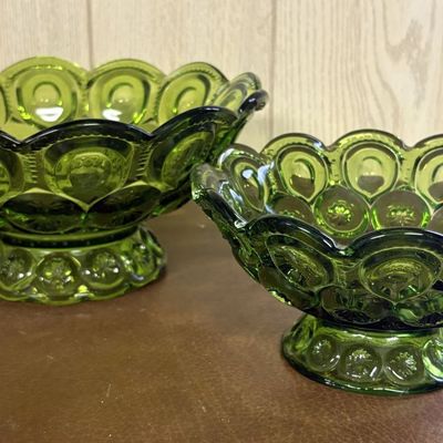 Sale Photo Thumbnail #683: A Pair of Olive Green Pressed Glass Moon and Star Pattern Footed Bowls