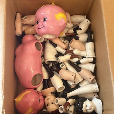 Sale Photo Thumbnail #461: A Collection of Glazed and Bisque Porcelain Doll Components