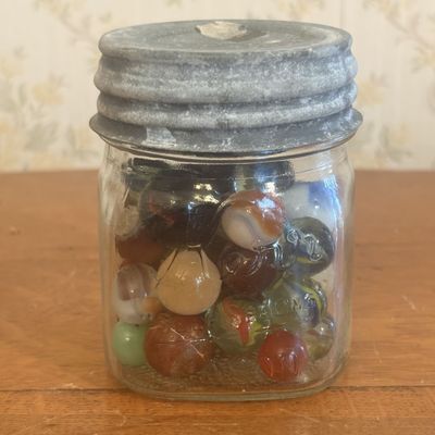 Sale Photo Thumbnail #141: A Collection of Vintage Glass Marbles in a Glass Sealing Jar with Zinc Lid