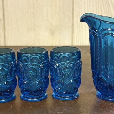 Sale Photo Thumbnail #699: A Set of Moon and Star Pattern Teal Blue Pressed Glassware