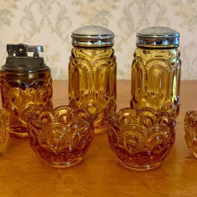 A Collection of Amber Pressed Glass Tableware in the Moon and Star Pattern