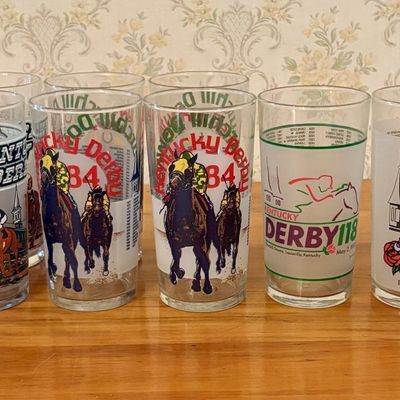 Sale Photo Thumbnail #396: A Collection of Eleven Kentucky Derby Churchill Downs Souvenir Mint Julep Glasses