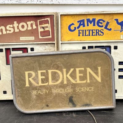 Sale Photo Thumbnail #798: A Trio of Vintage Advertising Displays Including Camel and Winston Clocks and a Redken Lighted Sign