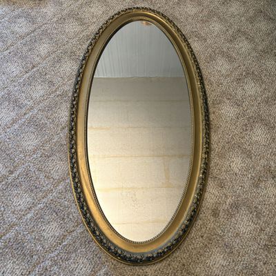 Sale Photo Thumbnail #549: Large Traditional Oval Wall Mirror with Gilt Decorative Frame