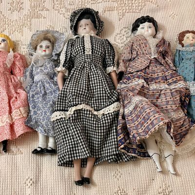 Sale Photo Thumbnail #494: A Collection of Five Vintage Style Porcelain Dolls in Period Dress
