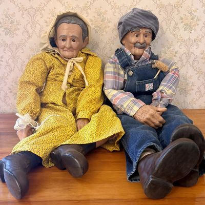 Sale Photo Thumbnail #543: A Pair of Life-Sized Folk Art Grandparent Shelf-Sitter Dolls