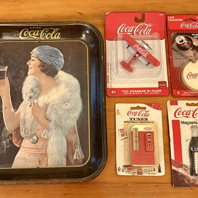 Sale Photo Thumbnail #381: A Collection of Coca-Cola Advertising Memorabilia Including a Metal Serving Tray and Four Packaged Accessories