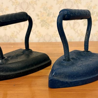 Sale Photo Thumbnail #386: A Pair of Antique Cast Iron Sad Irons