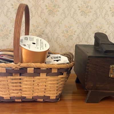 Sale Photo Thumbnail #564: Two Utilitarian Wooden Containers Comprising a Two-Tone Woven Splint Basket and a Shoe Shine Valet Box with Supplies