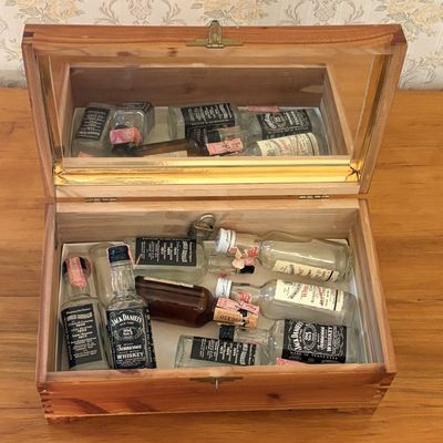 Sale Photo Thumbnail #540: Vintage Cedar Chest and Collection of Jack Daniel's and Dewar's Miniature Bottles