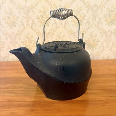 Sale Photo Thumbnail #360: Lodge Cast Iron Humidifier Tea Kettle with Coil Spring Handle