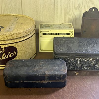 Sale Photo Thumbnail #725: A Collection of Five Vintage Advertising and Utility Metal Tins Including Charles Cookies and Hershey's