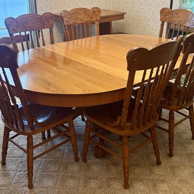 Sale Photo Thumbnail #608: Solid Oak Pedestal Dining Table and Set of Six Press Back Chairs
