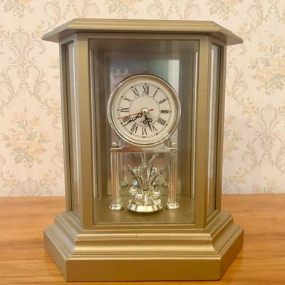 Sale Photo Thumbnail #358: Chinese Gold Tone Quartz Mantel Clock with Rotating Pendulum