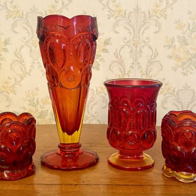 A Collection of Amberina Moon and Star Pattern Pressed Glass Tableware