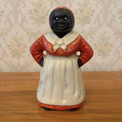 Sale Photo Thumbnail #398: Cast Iron Mammy Standing Still Bank