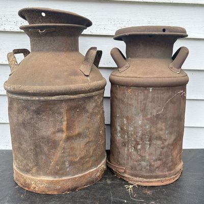 Sale Photo Thumbnail #806: Two Antique Industrial Steel Dairy Milk Cans with Lids