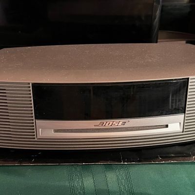 Bose Wave Music System with built-in CD player in graphite gray finish, showing light surface dust.