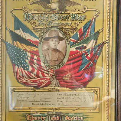 Framed World War I Roll of Honor certificate for Arnold M. Rivers, dated 1917-1919, featuring patriotic illustrations, Allied flags, and...