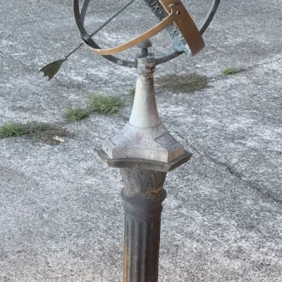 Sale Photo Thumbnail #8: Vintage armillary sphere sundial with an arrow gnomon, mounted on a fluted cast iron pedestal base.