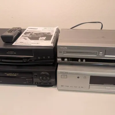Collection of Vintage Home Video Equipment, Including Multiple VCRs and DVD Decks