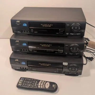 Three JVC HR-VP670U 4-Head Hi-Fi Stereo VHS Video Cassette Recorders
