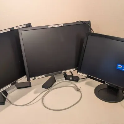 Three Dell Computer Monitors