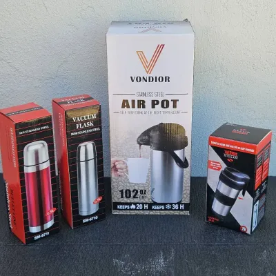 Thermal Dispenser Several Smaller Vacuum Flasks and A trTavel Mug 