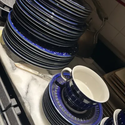 Arabia of Finland 'Valencia' pattern dinnerware, designed by Ulla Procopé, featuring hand-painted cobalt blue designs on white...