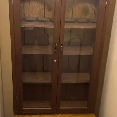 Wood Gun Cabinet With Glass Doors And Shelves