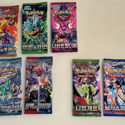 Lot of 7 Unopened Pokemon Card Packs - Includes 2 Mega Packs