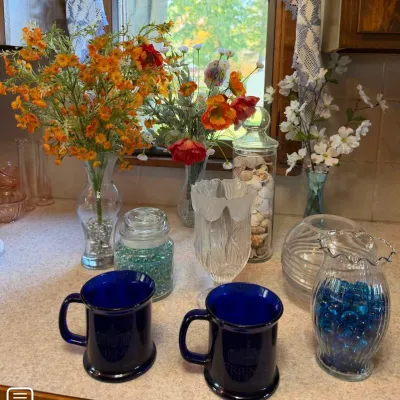 Assorted Glass Vases, Artificial Floral Arrangements, Cobalt Blue Mugs & Decorative Glassware - Lake Odessa Off-Site