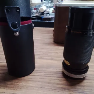 Vintage Kiron 80-200mm f/4 Macro Lens With A Tokina Cap And Its Protective Hard Case - Potterville