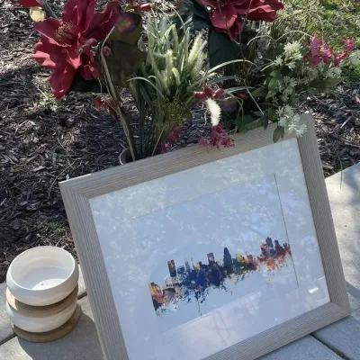 Framed Skyline Art Print, Ceramic Vases with Artificial Florals, and Nested Bowls - Grand Rapids Off-Site