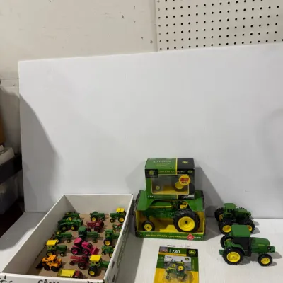 Sale Photo Thumbnail #315: Large John Deere Ertl Die-Cast Tractor Collection Boxed & Loose Models – Estate Sales Warehouse (GR)
