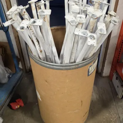 Barrel of White Metal Closet Rods