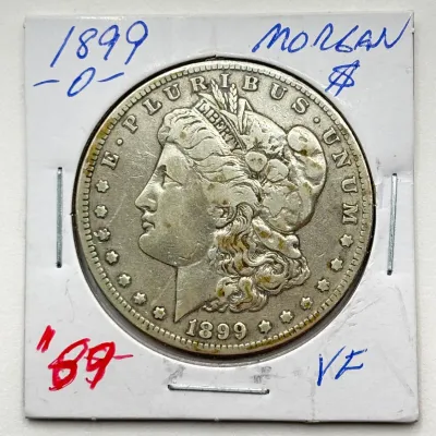 1899 O - Morgan Silver Dollar