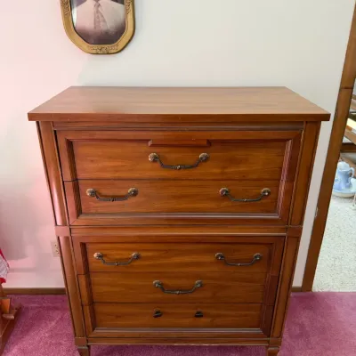 Traditional Wood Four-Drawer Chest of Drawers Dresser with Decorative Metal Pulls - Lake Odessa Off-Site