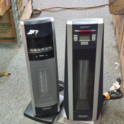 Two Tower Space Heaters - DeLonghi & Bionaire, Black/Silver, Digital Display & Adjustable Settings