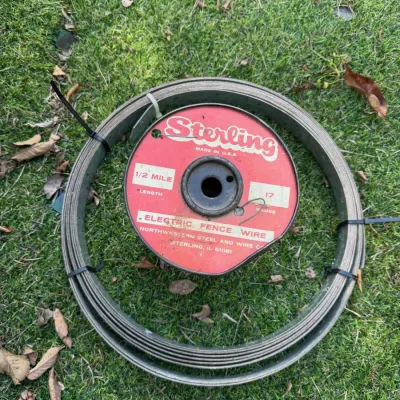 Sterling 1/2 Mile 17 Gauge Electric Fence Wire & Galvanized Metal Strapping Lot – Howard City Off-Site