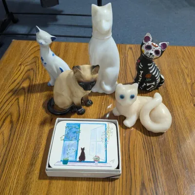 Cat Decor Lot: Vintage White Cat Avon Bottle & Vintage Figurines, 6 Cat Drink Coasters, & Cat Candle - Estate Sales Warehouse (GR)