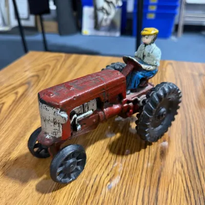 Sale Photo Thumbnail #320: Cast Iron Farm Tractor Toy with Driver Figure Red Agricultural Model – Estate Sales Warehouse (GR)