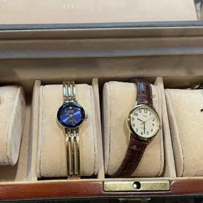 Three Assorted Ladies Wristwatches featuring Pulsar, Armitron, and Timex with Display Case - Grand Rapids Off-Site