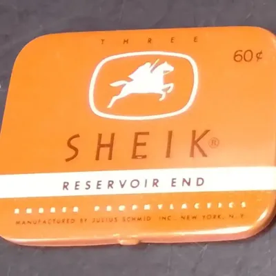 Vintage Orange Sheik Prophylactic Tin By Julius Schmid Inc., New York (Original Price 60 Cents) – Potterville