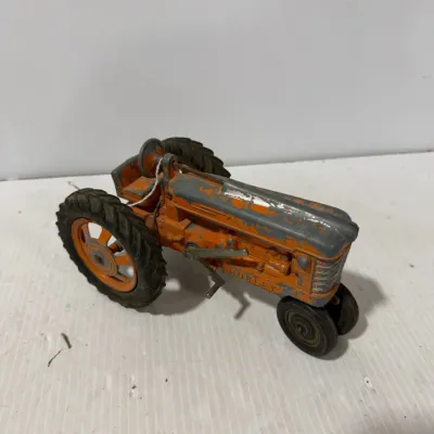 Sale Photo Thumbnail #318: Vintage Hubley Orange & Gray Die-Cast Farm Tractor Toy – Estate Sales Warehouse (GR)